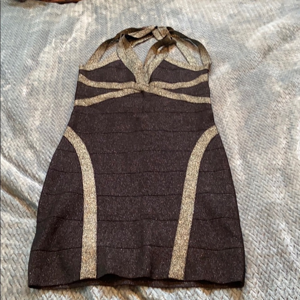 Woman’s Bebe body con dress size Large